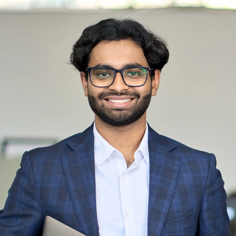 smiling young indian business man wearing suit sta 2025 02 11 16 16 45 utc